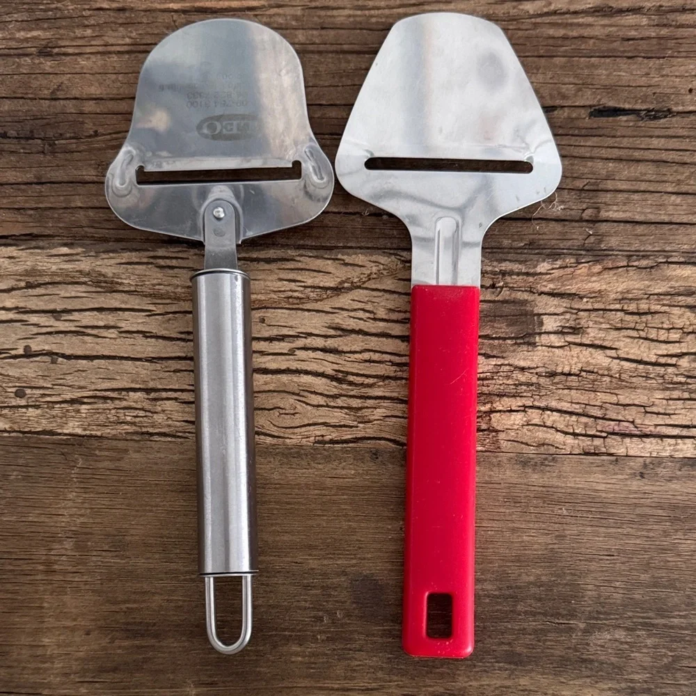 Stainless Steel LEO Cheese Slicer and Karlsson Nilsson Slicer with Red Handle